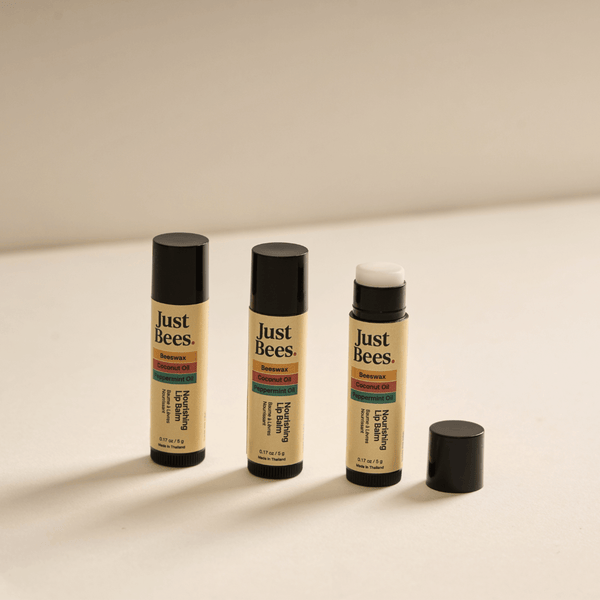 Trio of Just Bees Natural Peppermint Lip Balms for dry lips, perfect for any occasion.